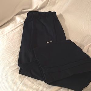 Men’s large navy knit Nike warm up pants with zippers at ankle
